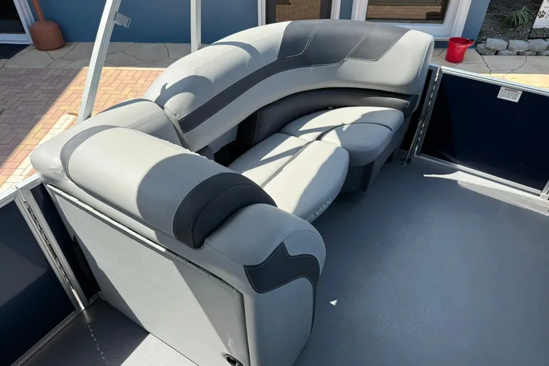 Slide: The Image of 2022 Sylvan L3 DLZ boat interior with gray cushioned seating. - 20
