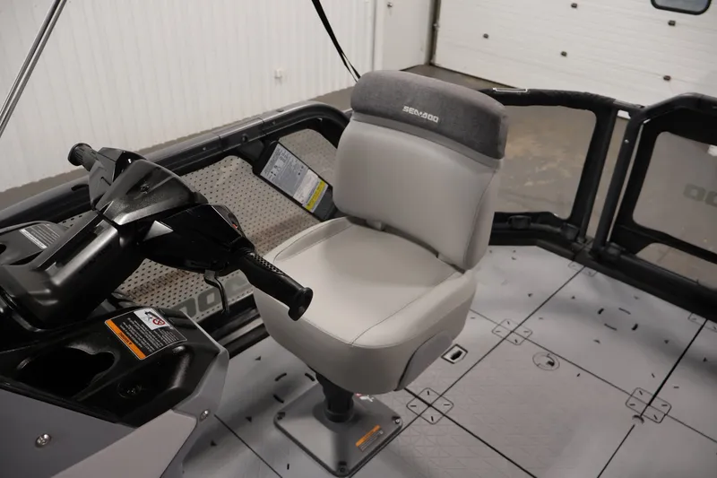 Slide: The Image of 2026 Sea-Doo Switch Compact interior with steering console and comfortable seating. - 18