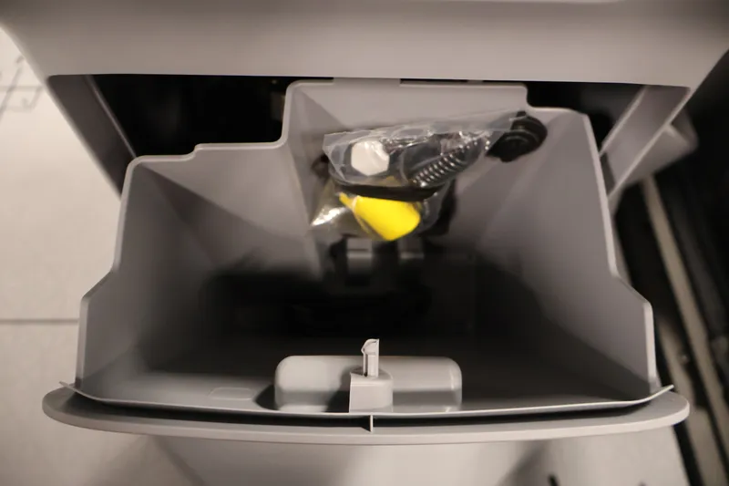 Slide: The Image of Storage compartment of 2026 Sea-Doo Switch Compact with accessories inside. - 17