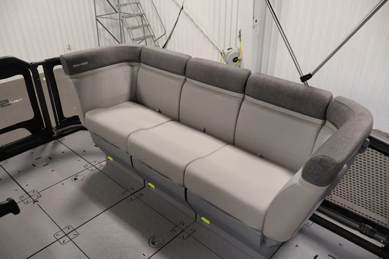 Slide: The Image of 2026 Sea-Doo Switch Compact interior seating, featuring modern gray upholstery and spacious design. - 19