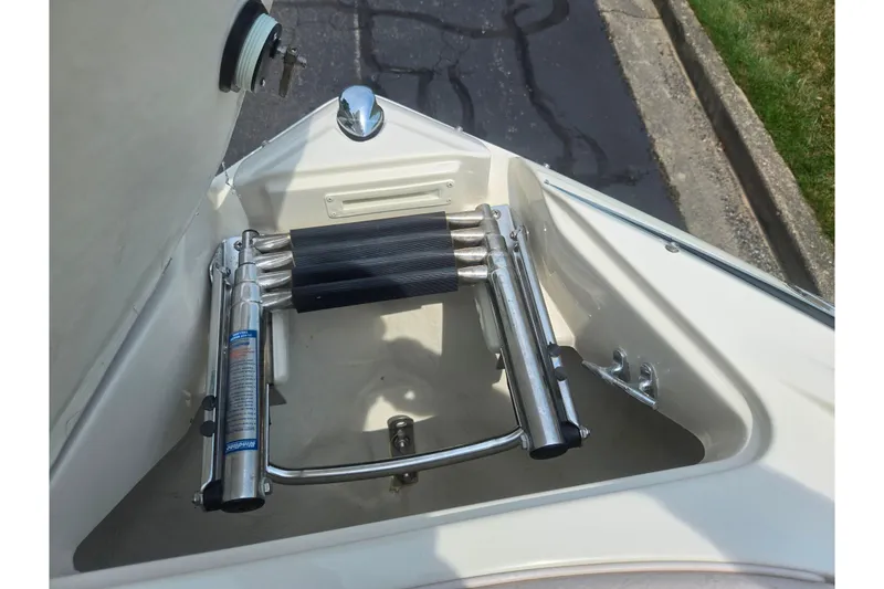 Slide: The Image of Foldable boat ladder on a 2007 Azure AZ228, dockside view. - 19