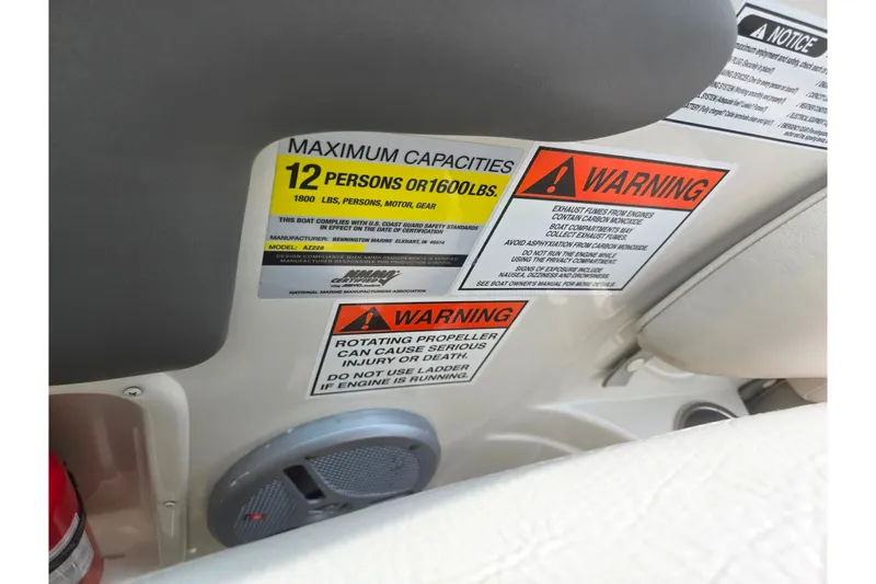 Slide: The Image of Safety warnings and capacity limits on 2007 Azure AZ228 boat interior. - 13