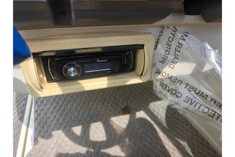 Slide: The Image of Pioneer stereo system in a 2007 Azure AZ228 boat dashboard. - 25