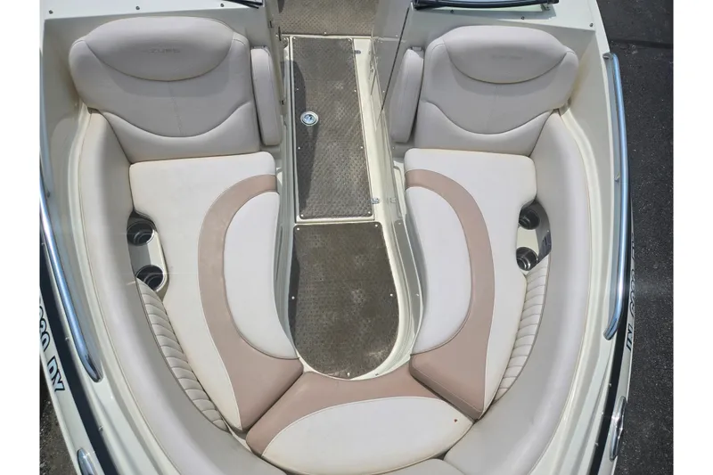 Slide: The Image of 2007 Azure AZ228 boat interior with beige seating and cup holders. - 20
