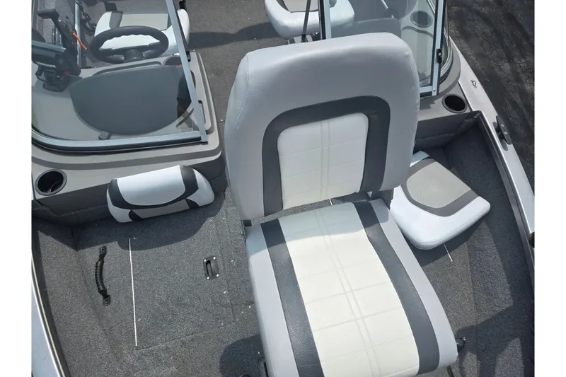 Slide: The Image of 2014 Crestliner 1650 Super Hawk interior with gray and white seating and steering console. - 22