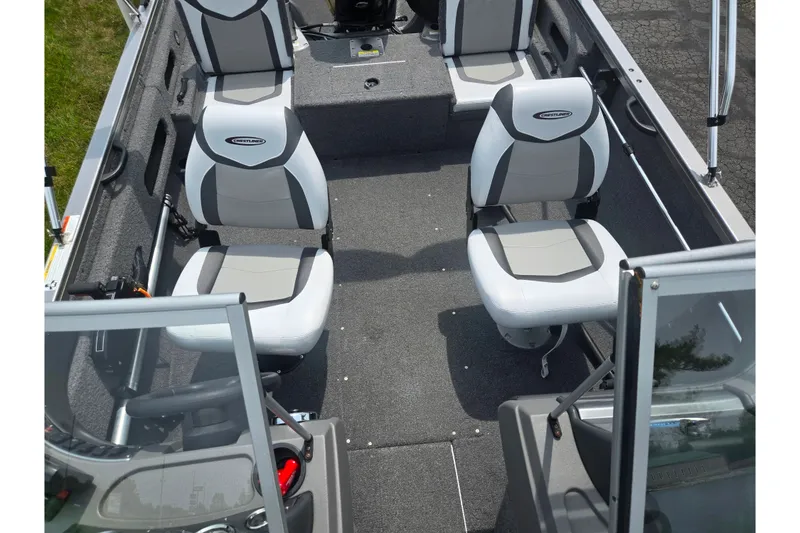 Slide: The Image of 2014 Crestliner 1650 Super Hawk interior with gray seating and carpeted flooring. - 24