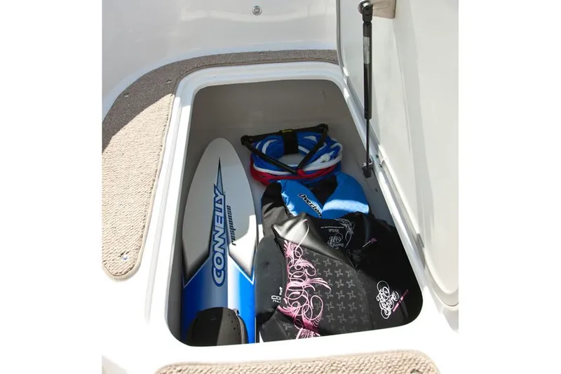 Slide: The Image of Manufacturer Provided Image: Storage compartment of 2014 Hurricane SunDeck 187 OB with water sports gear. - 9