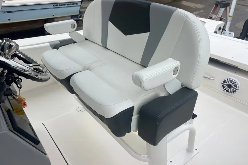 Slide: The Image of 2024 Robalo 266 Cayman boat seating with modern design and comfortable armrests. - 13