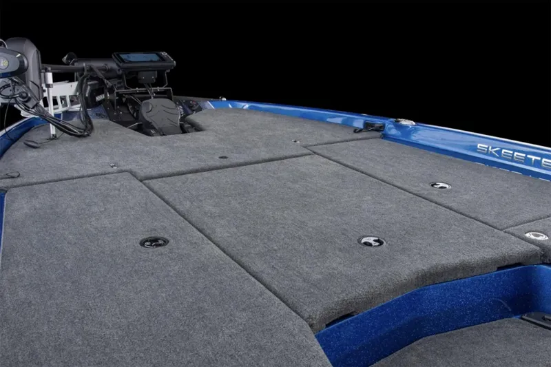 Slide: The Image of Manufacturer Provided Image: 2025 Skeeter ZXR19 boat deck with gray carpet and advanced control panel. - 23