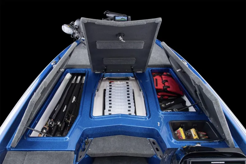 Slide: The Image of Manufacturer Provided Image: 2025 Skeeter ZXR19 boat interior with storage compartments and fishing gear. - 22