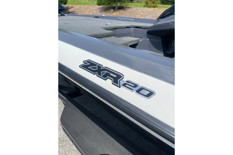 Slide: The Image of 2024 Skeeter ZXR20 boat, close-up of model logo on sleek exterior. - 4