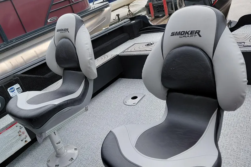 Slide: The Image of 2026 Smoker Craft Excursion 166 SC boat seats, featuring sleek design and comfortable upholstery. - 15