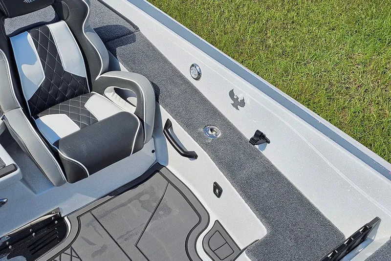Slide: The Image of Luxurious interior of 2027 Phoenix 921 Elite X boat with stylish seating and sleek design. - 21