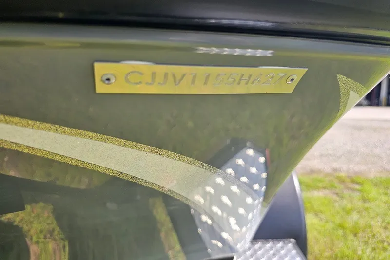Slide: The Image of Close-up of Phoenix 921 Elite X 2027 boat hull identification number. - 30