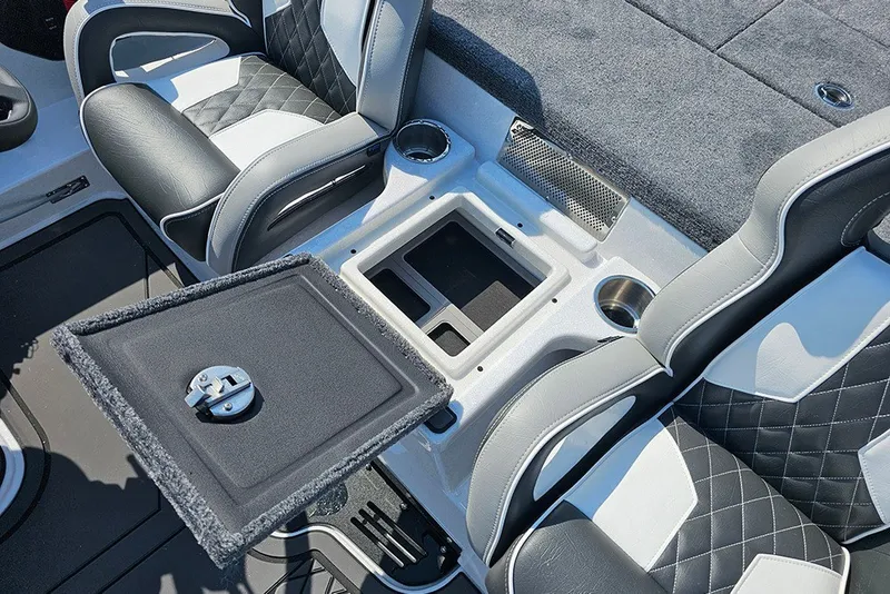 Slide: The Image of Interior of 2027 Phoenix 921 Elite X boat with luxury seating and storage compartments. - 14