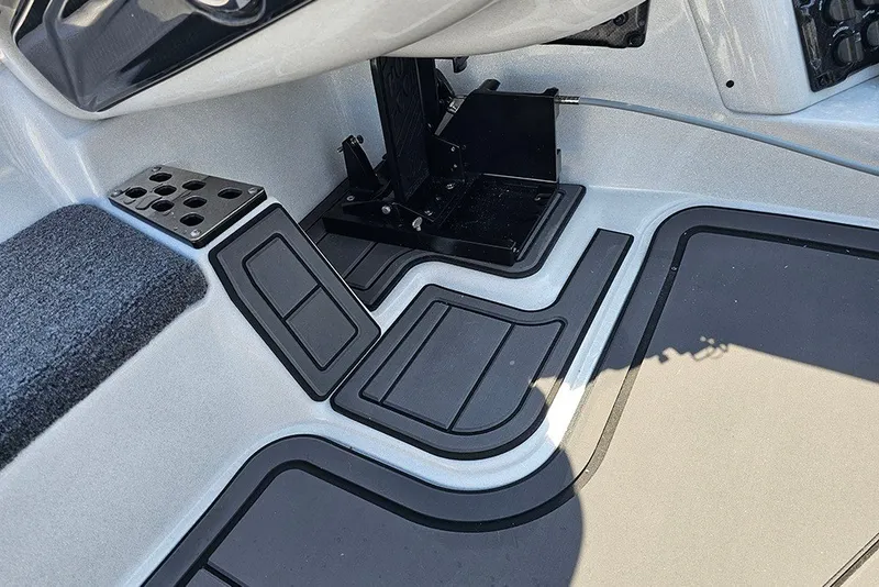 Slide: The Image of Interior view of 2027 Phoenix 921 Elite X boat cockpit with sleek design elements. - 17