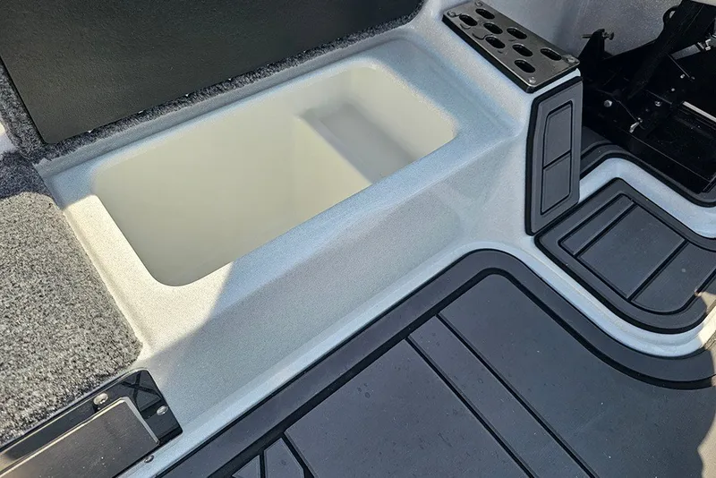 Slide: The Image of Interior view of 2027 Phoenix 921 Elite X boat, featuring storage compartment and sleek design. - 19