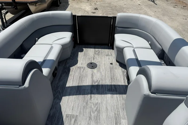 Slide: The Image of 2026 Bentley Pontoons Legacy 243 Navigator interior with gray seating and flooring. - 12