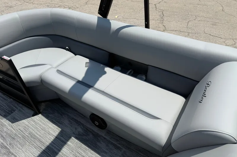 Slide: The Image of 2026 Bentley Pontoons Legacy 243 Navigator interior with sleek gray seating. - 11