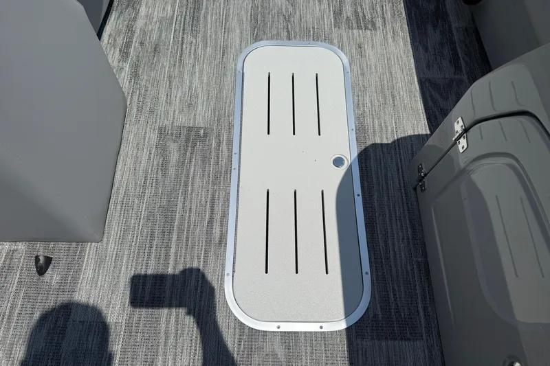 Slide: The Image of Floor hatch on 2026 Bentley Pontoons Legacy 243 Navigator, featuring sleek design and durable materials. - 8