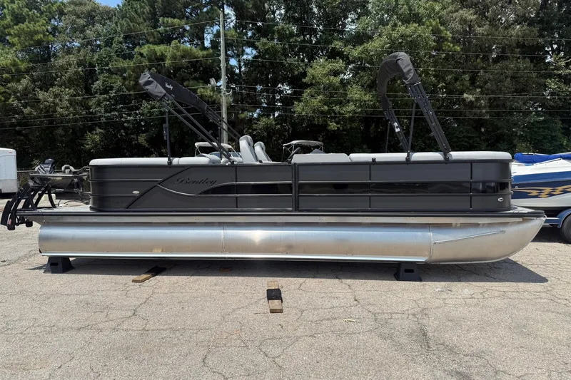 Slide: The Image of 2026 Bentley Pontoons Legacy 243 Navigator on display, featuring sleek design and modern amenities. - 1