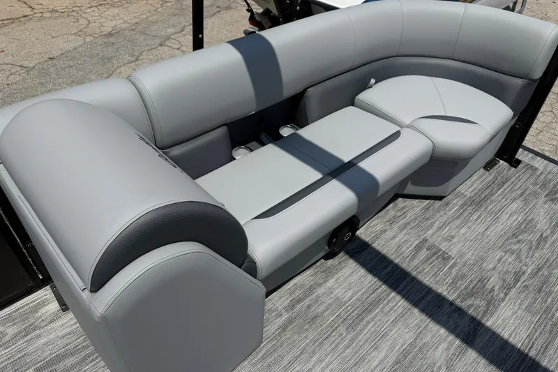 Slide: The Image of 2026 Bentley Pontoons Legacy 243 Navigator interior seating, featuring sleek gray upholstery. - 10