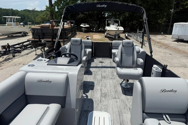 Slide: The Image of 2026 Bentley Pontoons Legacy 243 Navigator with luxurious seating and sleek design. - 3