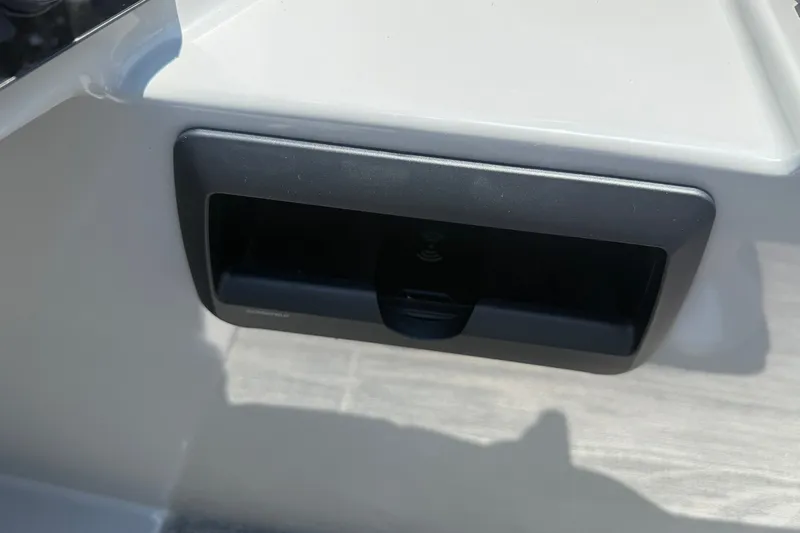 Slide: The Image of 2026 Bentley Pontoons Legacy 243 Navigator, dashboard compartment detail. - 7
