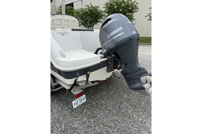 Slide: The Image of 2022 Robalo R222 Center Console boat with Yamaha outboard motor. - 7