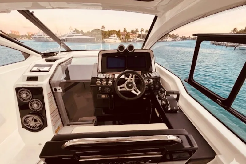 Slide: The Image of Interior of 2026 Granfort 370 GTX yacht with modern helm and ocean view. - 6