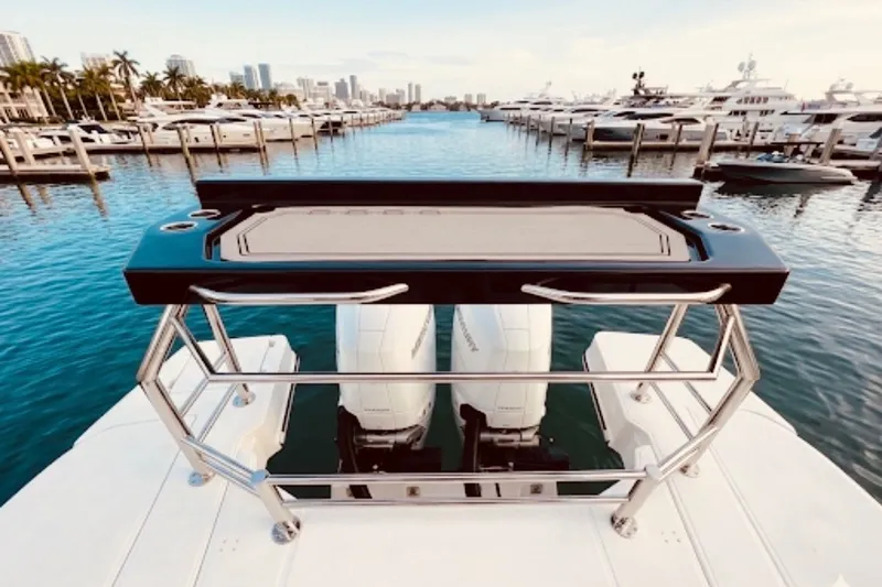 Slide: The Image of Granfort 370 GTX 2026 yacht with dual engines, docked in a marina with city skyline. - 3