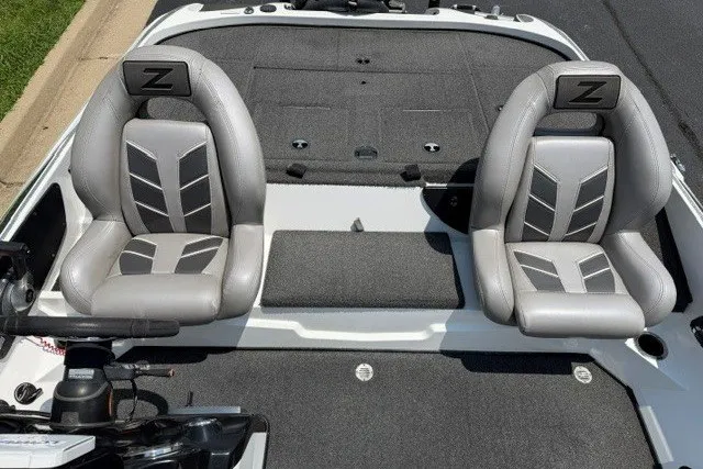 Slide: The Image of Two gray seats on a 2017 Nitro Z19 Pro boat deck. - 7