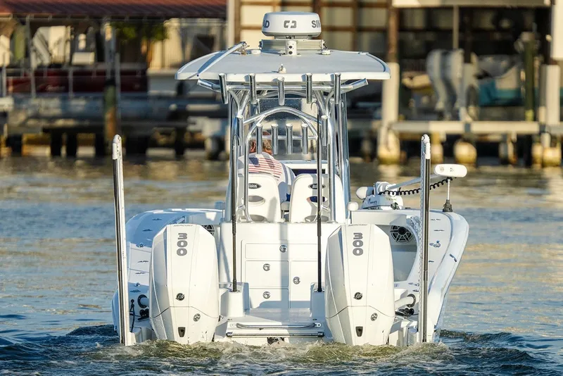 Slide: The Image of 2020 Costa Custom Boats 264HC with dual 300 horsepower engines on the water. - 15