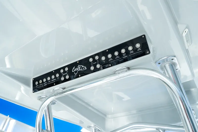 Slide: The Image of Control panel of 2020 Costa Custom Boats 264HC, featuring sleek design and modern functionality. - 22
