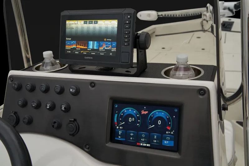 Slide: The Image of The dashboard of a 2024 Ranger RB210 with modern displays and controls. - 48