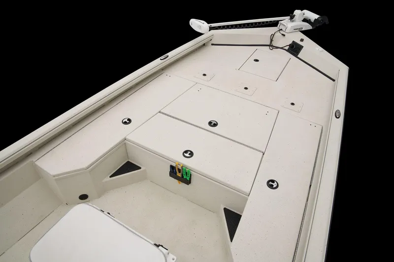 Slide: The Image of The image shows the deck of a 2024 Ranger RB210 boat with storage and fishing gear. - 30