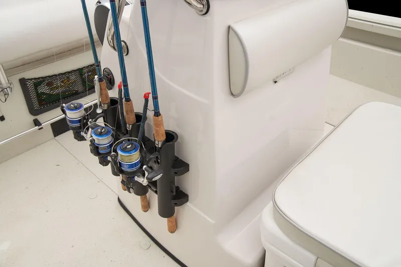 Slide: The Image of Fishing rod holders on a 2024 Ranger RB210 boat. - 43