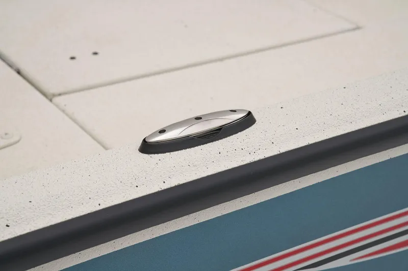 Slide: The Image of Close-up of a boat deck with blue and red trim. - 27