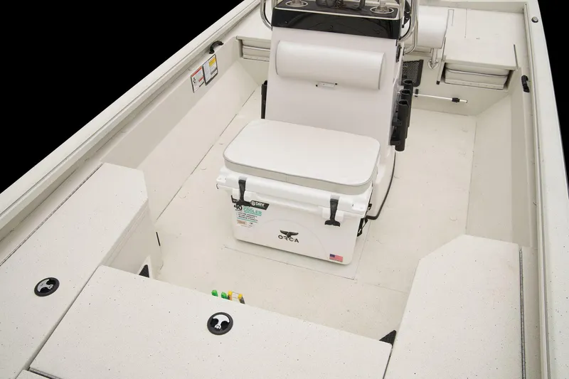 Slide: The Image of The image shows the cockpit of a 2024 Ranger RB210 boat with a central console. - 41