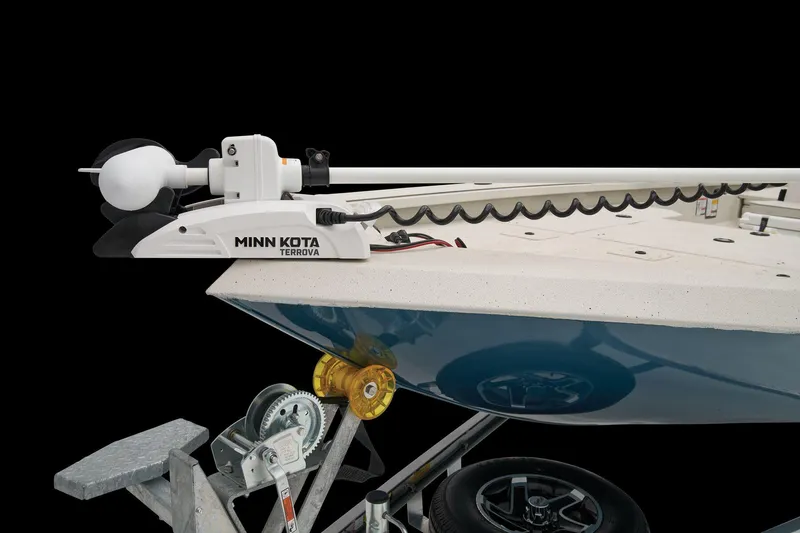 Slide: The Image of The image shows the bow of a 2024 Ranger RB210 boat with a Minn Kota Terrova motor. - 25