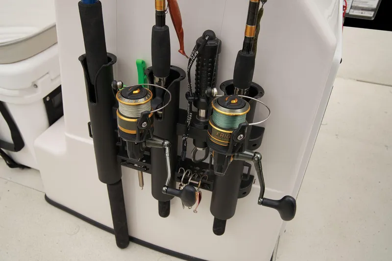 Slide: The Image of Fishing rod holder on a boat with several rods mounted. - 44