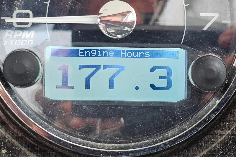 Slide: The Image of Monterey 295 Sport Yacht 2021 engine hours display showing 177.3 hours. - 21