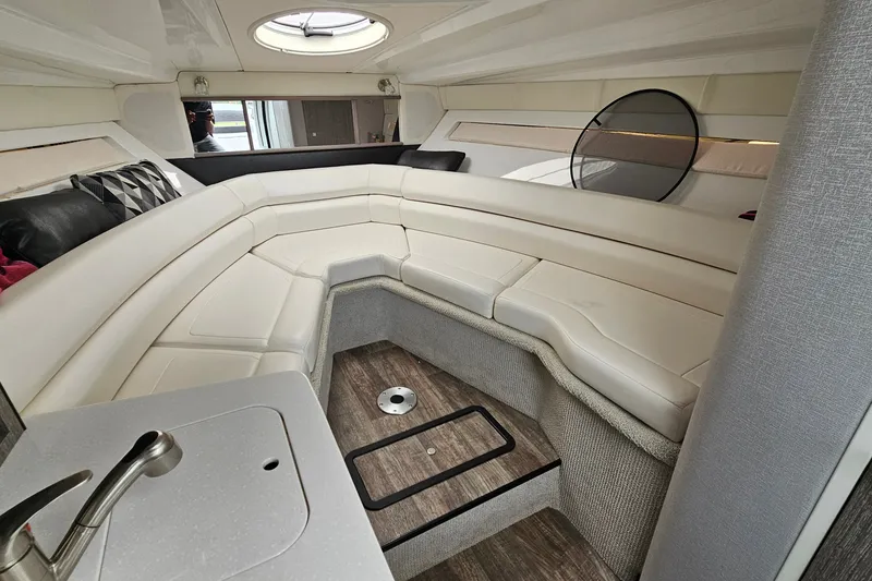 Slide: The Image of Interior of 2021 Monterey 295 Sport Yacht with elegant seating and modern design. - 14
