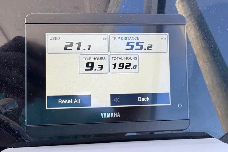 Slide: The Image of Yamaha display showing fuel usage, trip distance, and hours for 2023 Edgewater 248CX Crossover. - 33