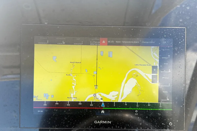Slide: The Image of Garmin navigation display on 2023 Edgewater 248CX Crossover boat, showing Ruskin Inlet map. - 40