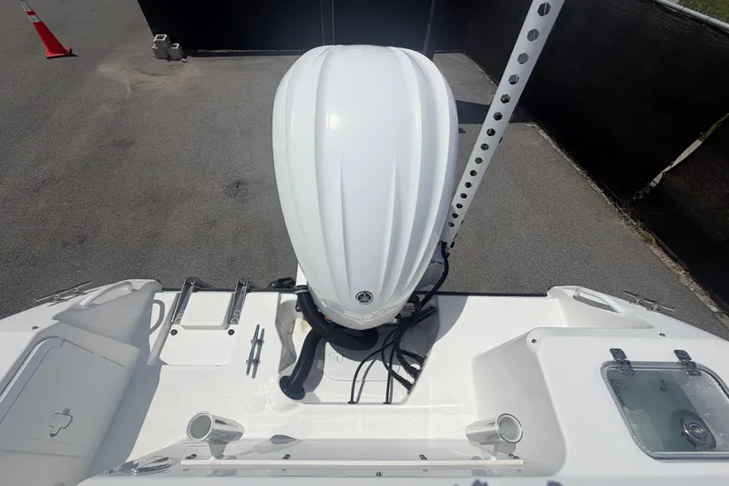 Slide: The Image of 2023 Edgewater 248CX Crossover boat with outboard motor, viewed from above. - 86