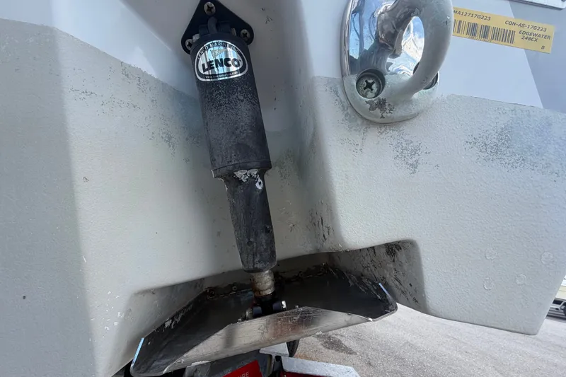 Slide: The Image of 2023 Edgewater 248CX Crossover boat with Lenco trim tab detail. - 5