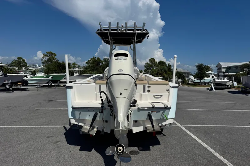Slide: The Image of 2017 Sea Born LX22 Center Console boat in parking lot, rear view. - 3