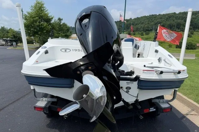 Slide: The Image of Rear view of a 2017 Tahoe 1950 boat with an outboard motor on a trailer. - 8