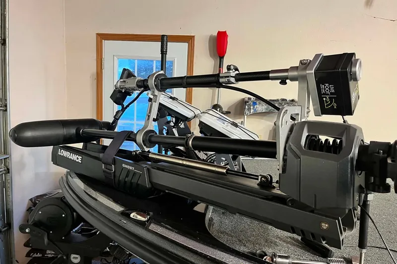 Slide: The Image of Lowrance Ghost trolling motor on 2022 Nitro Z21 XL boat in a garage setting. - 10